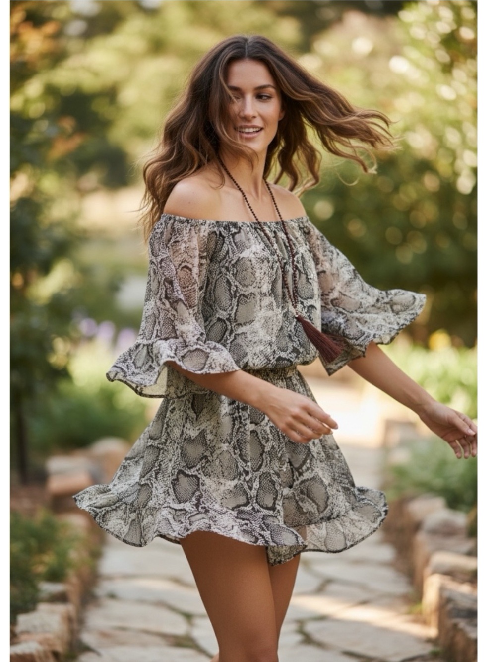 Off-Shoulder Snake Print Women’s romper. Gray. New with tags